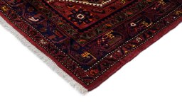 Backside of handmade New Malayer rug showing knot structure and weave density