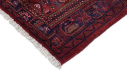 Backside of handmade New Malayer rug showing knot structure and weave density