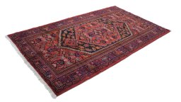Close-up detail of New Malayer rug from Iran / Persia showing Wool weave