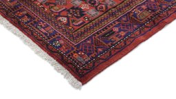 Backside of handmade New Malayer rug showing knot structure and weave density