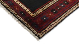 Backside of handmade 1990s Malayer rug showing knot structure and weave density