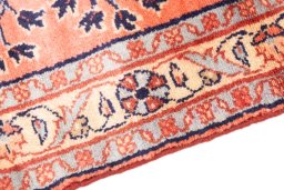 Backside of handmade 1949s Mehraban rug showing knot structure and weave density