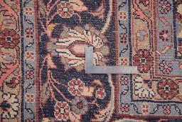 Surface texture of 2000s Mehraban rug with natural Wool and intricate pattern