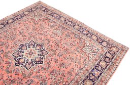 Surface texture of 2000s Mehraban rug with natural Wool and intricate pattern
