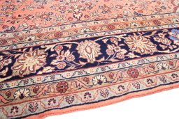 Backside of handmade 2000s Mehraban rug showing knot structure and weave density