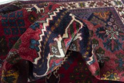 Close-up detail of 2000s Meymeh rug from Iran / Persia showing Wool weave
