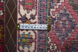 Surface texture of 2000s Meymeh rug with natural Wool and intricate pattern
