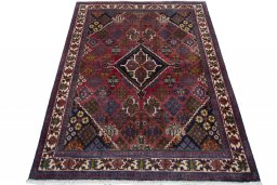 Surface texture of 2000s Meymeh rug with natural Wool and intricate pattern