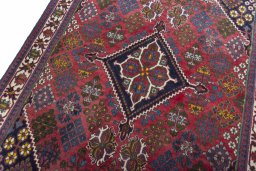 Backside of handmade 2000s Meymeh rug showing knot structure and weave density