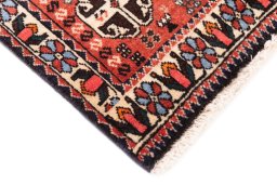 Backside of handmade 1975s Meymeh rug showing knot structure and weave density