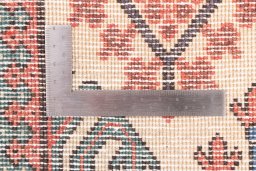 Corner detail of 1999s Meymeh rug showing border pattern and Wool pile