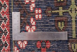 Corner detail of 1977s Meymeh rug showing border pattern and Wool pile