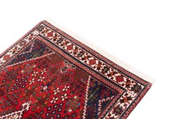 Surface texture of 1977s Meymeh rug with natural Wool and intricate pattern
