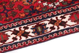 Backside of handmade 1977s Meymeh rug showing knot structure and weave density