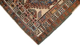Backside of handmade 1900s Sarab rug showing knot structure and weave density