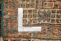 Close-up detail of 1900s Sarab rug from Iran / Persia showing Wool weave