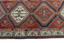 Close-up detail of 1930s Sarab rug from Iran / Persia showing Wool weave