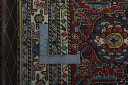 Backside of handmade 1970s Sarab rug showing knot structure and weave density