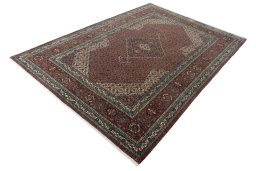 Corner detail of 1970s Sarab rug showing border pattern and Wool pile