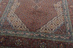 Close-up detail of 1970s Sarab rug from Iran / Persia showing Wool weave