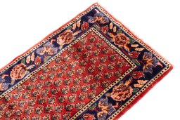 Surface texture of 1989s Sarab rug with natural Wool and intricate pattern