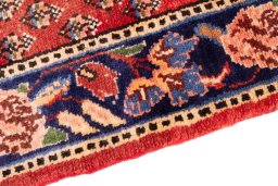 Backside of handmade 1989s Sarab rug showing knot structure and weave density