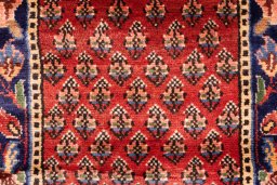 Close-up detail of 1989s Sarab rug from Iran / Persia showing Wool weave