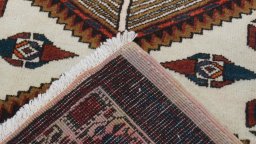 Close-up detail of 2000s Sarab rug from Iran / Persia showing Wool weave