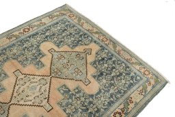 Surface texture of 1920s Senneh rug with natural Wool and intricate pattern
