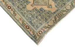 Backside of handmade 1920s Senneh rug showing knot structure and weave density