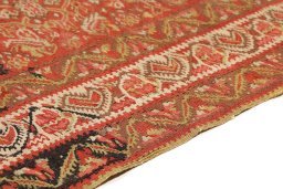 Backside of handmade 1900s Senneh rug showing knot structure and weave density