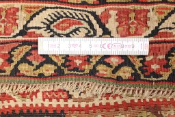 Close-up detail of 1900s Senneh rug from Iran / Persia showing Wool weave