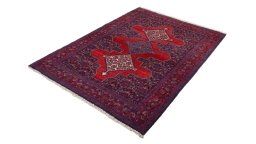 Corner detail of 1940s Senneh rug showing border pattern and Wool pile