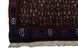 Close-up detail of New Senneh rug from Iran / Persia showing Wool weave