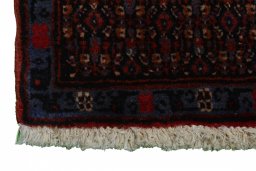 Close-up detail of New Senneh rug from Iran / Persia showing Wool weave