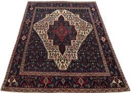 Surface texture of 1970s Senneh rug with natural Wool and intricate pattern