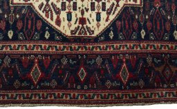 Central medallion detail of 1970s Senneh rug from Iran / Persia
