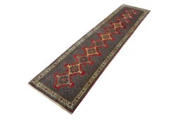 Corner detail of New Senneh rug showing border pattern and Wool pile