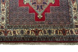 Central medallion detail of New Senneh rug from Iran / Persia