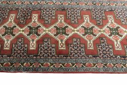 Close-up detail of 2000s Senneh rug from Iran / Persia showing Wool weave