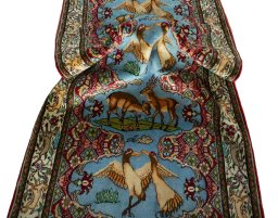 Corner detail of 2000s Senneh rug showing border pattern and Wool pile