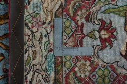 Close-up detail of 2000s Senneh rug from Iran / Persia showing Wool weave