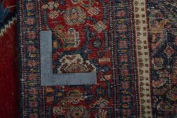 Surface texture of 1930s Senneh rug with natural Wool and intricate pattern