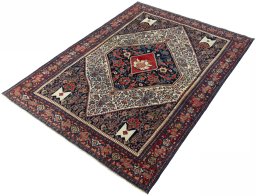 Corner detail of 1930s Senneh rug showing border pattern and Wool pile