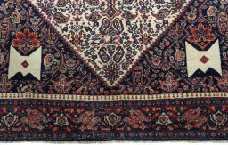 Close-up detail of 1930s Senneh rug from Iran / Persia showing Wool weave