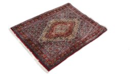 Close-up detail of 1990s Senneh rug from Iran / Persia showing Wool weave