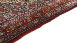 Central medallion detail of 1990s Senneh rug from Iran / Persia
