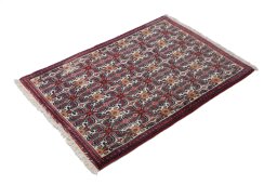 Close-up detail of 1990s Senneh rug from Iran / Persia showing Wool weave