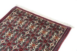 Surface texture of 1990s Senneh rug with natural Wool and intricate pattern