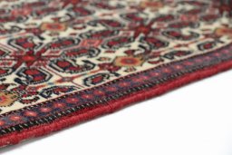 Central medallion detail of 1990s Senneh rug from Iran / Persia